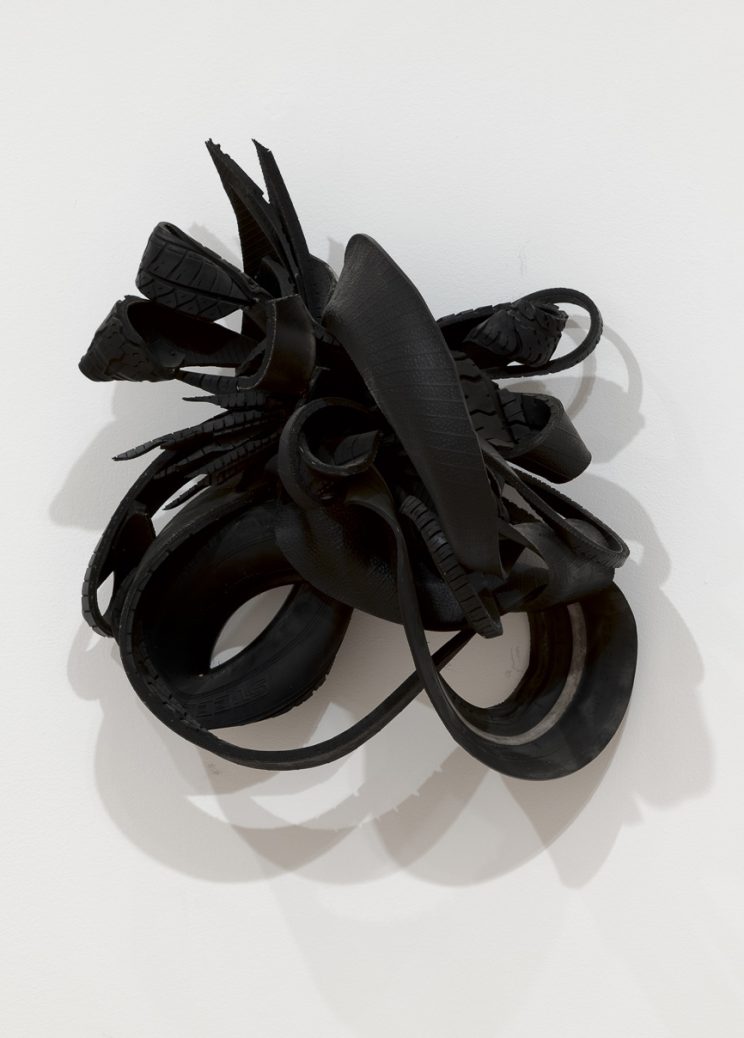 <p>Chakaia Booker (U.S., b. 1953). <em>Liquid Infusion</em>, 2004. Rubber tire and wood. Henry Art Gallery, gift of Dennis Braddock, in memory of Janice Niemi. 2021.6</p>
