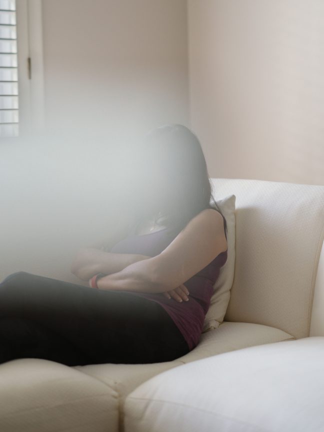 <p>Jarod Lew (b. 1987, Detroit, MI; lives and works in New Haven, CT), <em>Untitled (Mom on Couch)</em>, 2021. Archival pigment print. Cantor Arts Center, Stanford University, gift of Pamela and David Hornik in support of the Asian American Art Initiative. © Jarod Lew</p>

