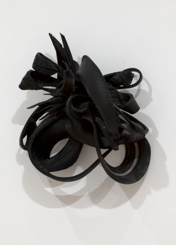 <p>Chakaia Booker (U.S., b. 1953). <em>Liquid Infusion</em>, 2004. Rubber tire and wood. Henry Art Gallery, gift of Dennis Braddock, in memory of Janice Niemi. 2021.6</p>
